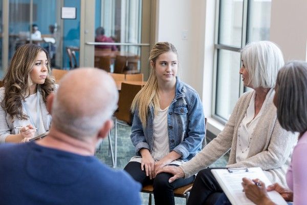 Image of people in group therapy